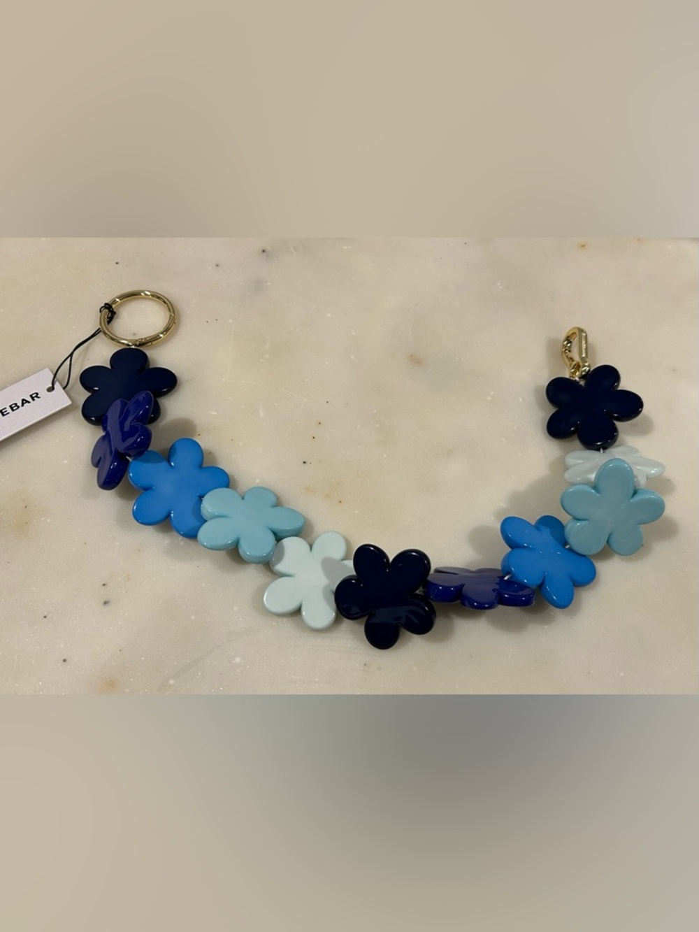 BaubleBar Blue and White Floral Bag Accessory